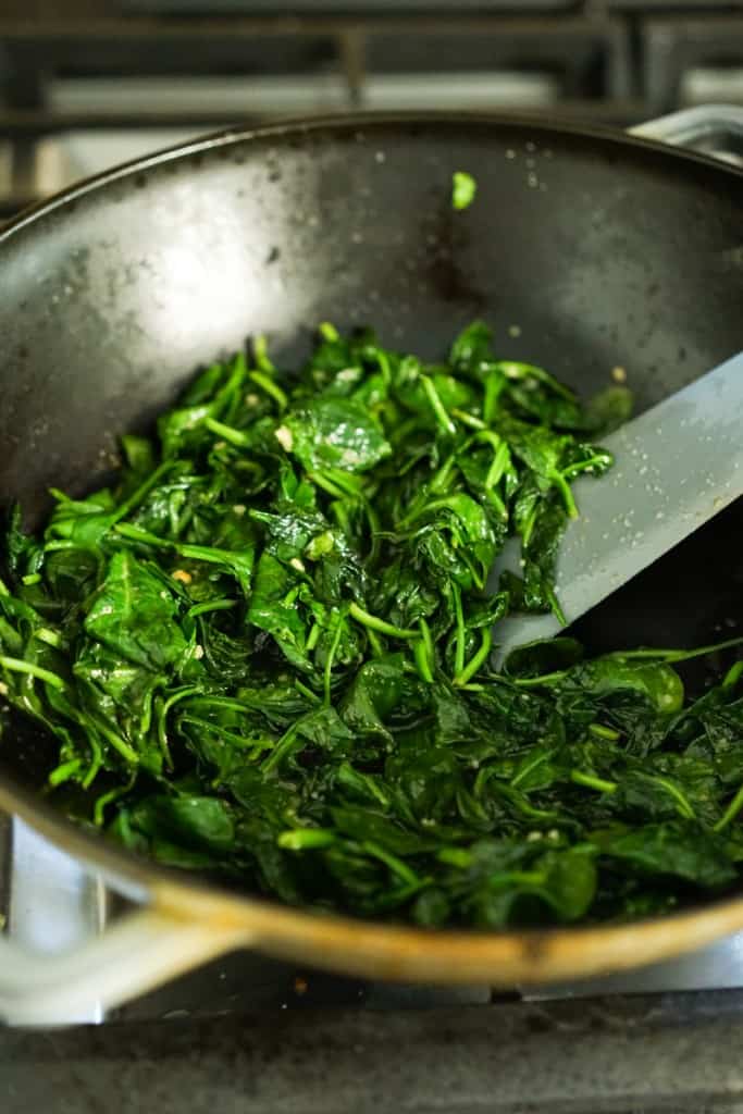 Cooked spinach in skillet