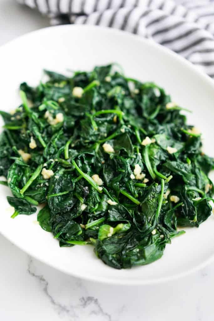 A plate of spinach sautéed with garlic