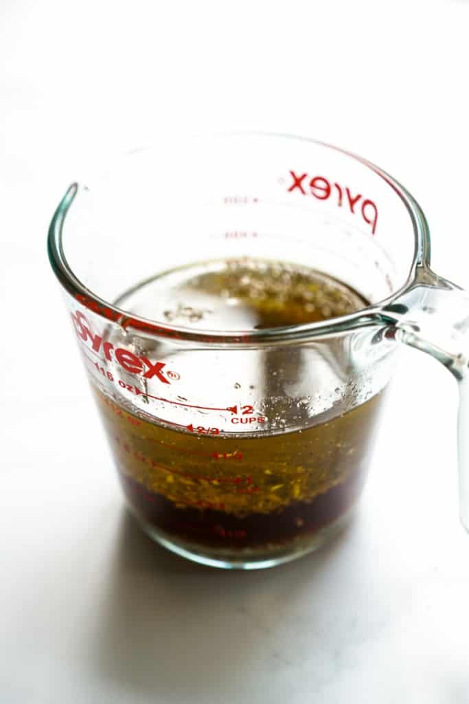 Italian dressing in a measuring cup
