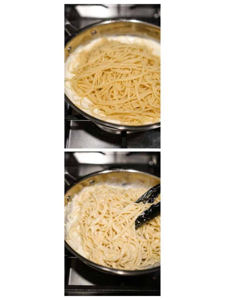 Tossing pasta in cream sauce on a skillet on stovetop
