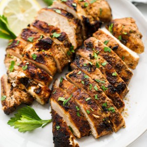 Slices of grilled chicken with a golden brown crust