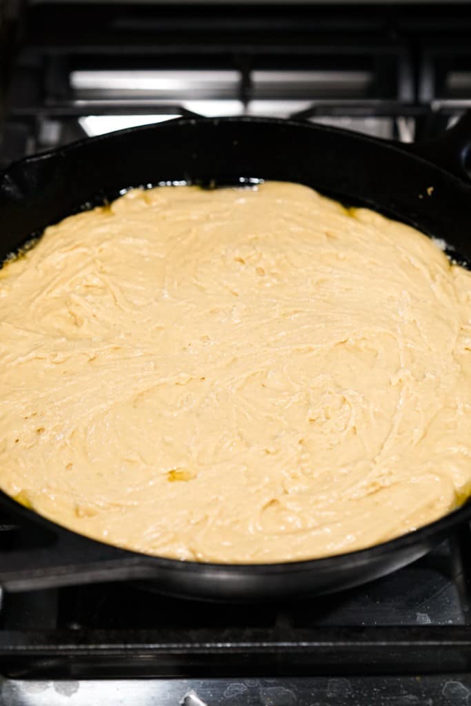 cake batter in cast iron skillet