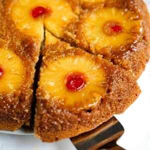 A triangular slice of pineapple upside down cake