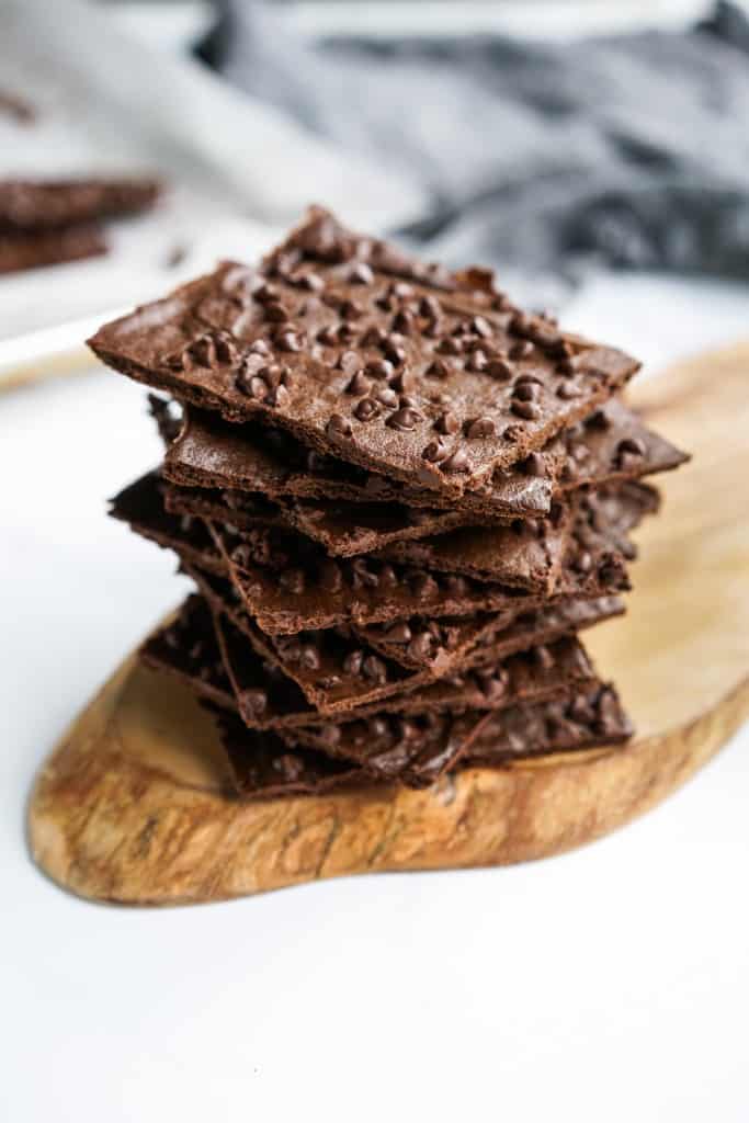 A stack of brownie brittle topped with chocolate chips