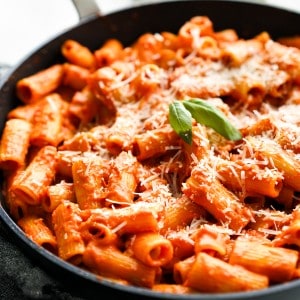 Spicy rigatoni with tomato vodka sauce in skillet