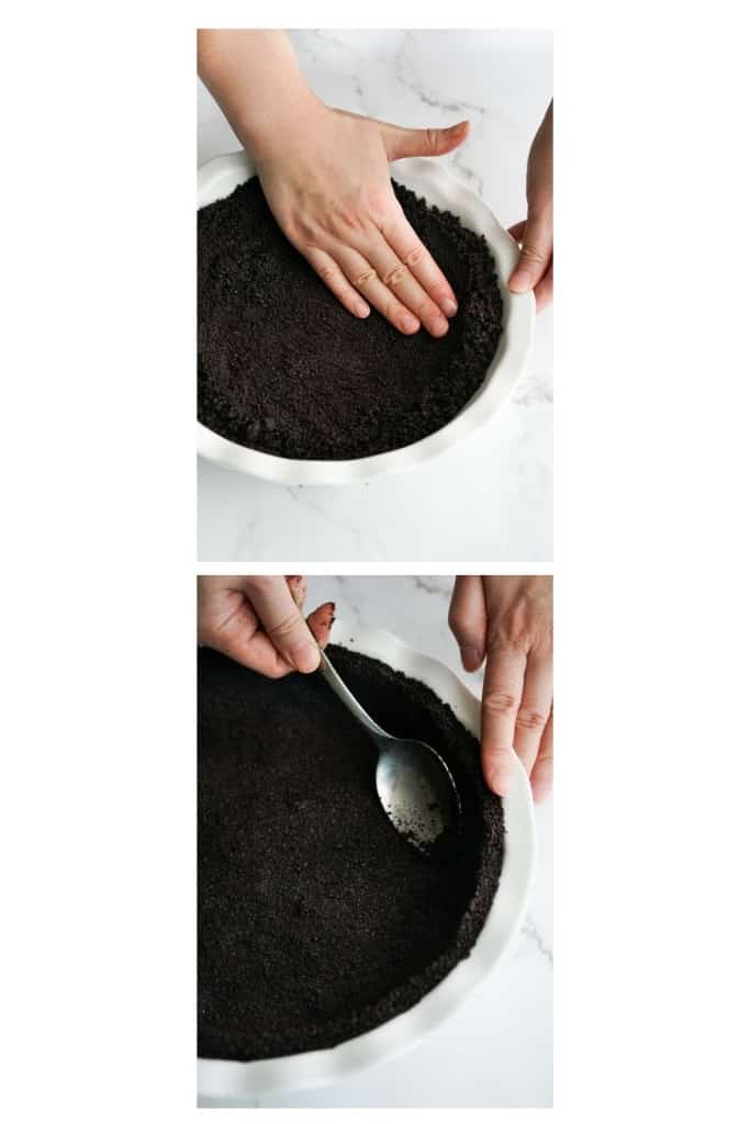 Using hands and spoon to shape the Oreo crust in the pie pan