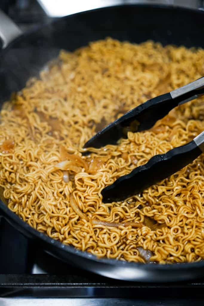 Ramen noodles in sauce in a skillet