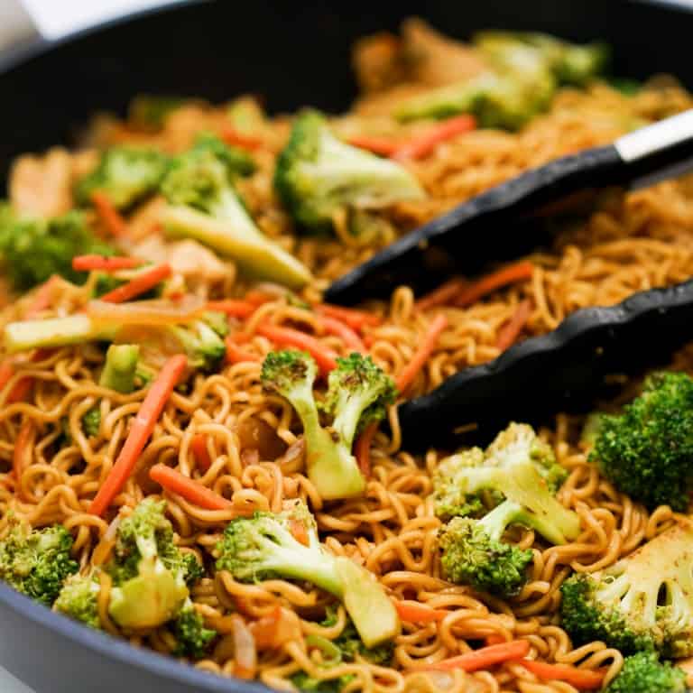 Cooking ramen noodle stir fry in a skillet