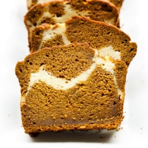 Sliced pumpkin bread with cream cheese swirl