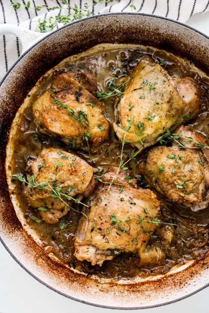 Top down view of five pieces of braised chicken thighs