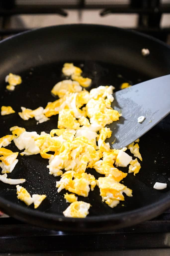 Scrambling eggs in the skillet