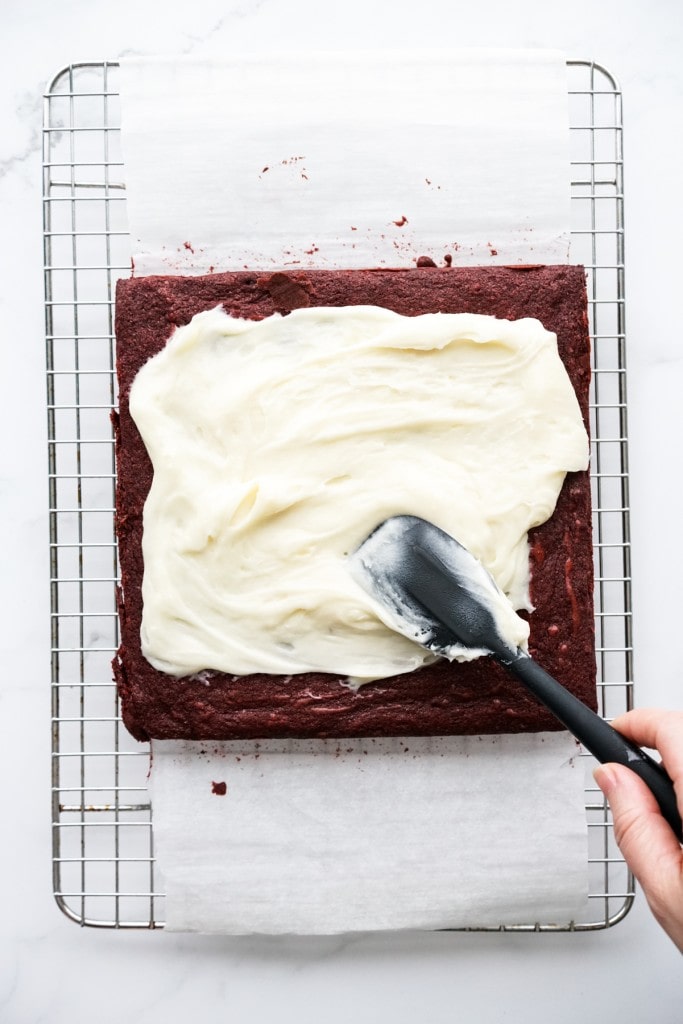 Frosting a brownie
