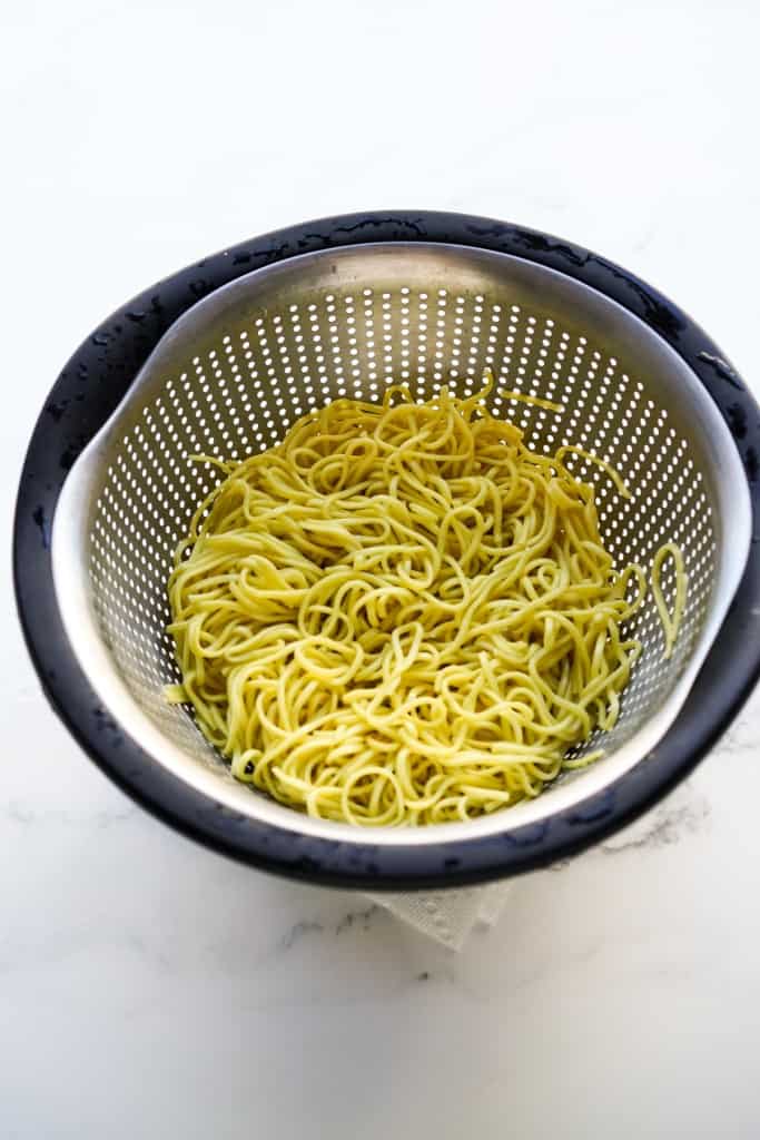 Chow mein noodles in colander