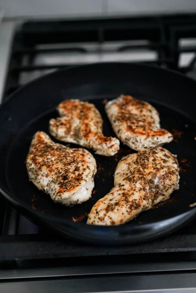 Searing chicken breast on stovetop
