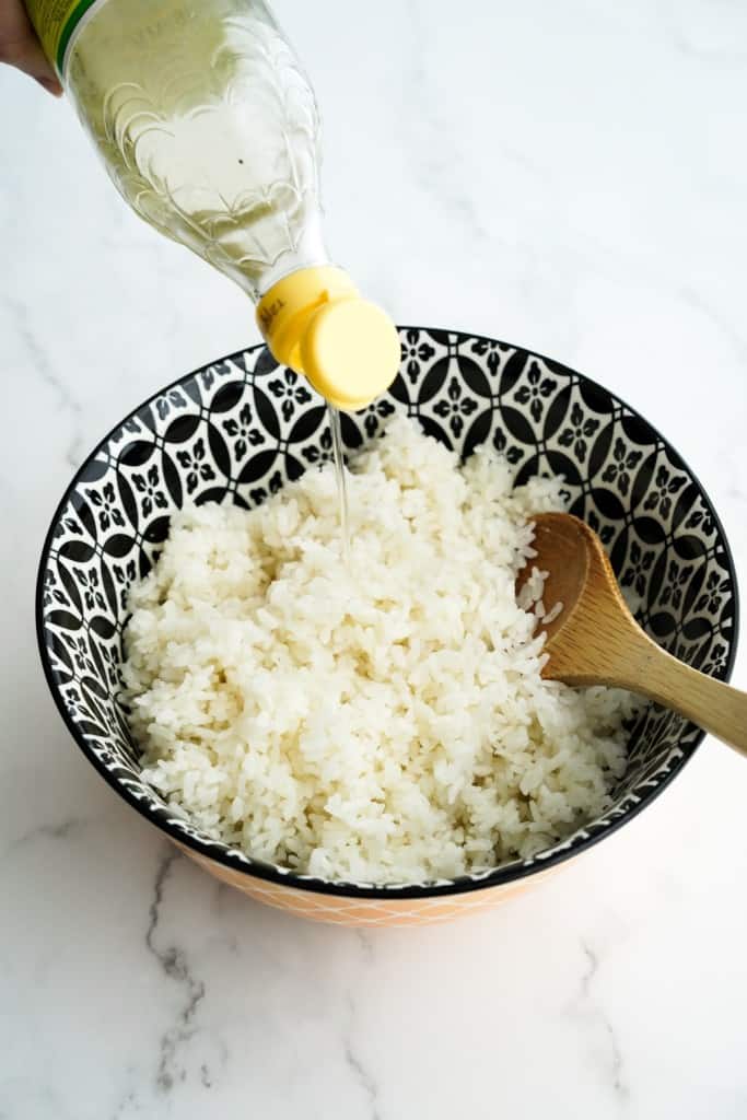 Seasoning sushi rice in a bowl