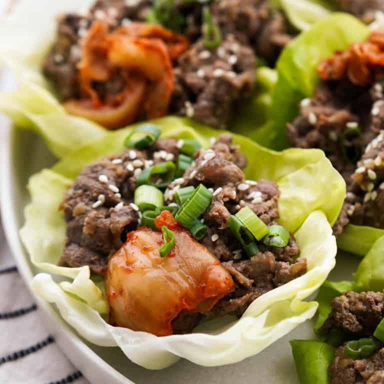 Korean beef bulgogi and kimchi wrapped in lettuce wraps