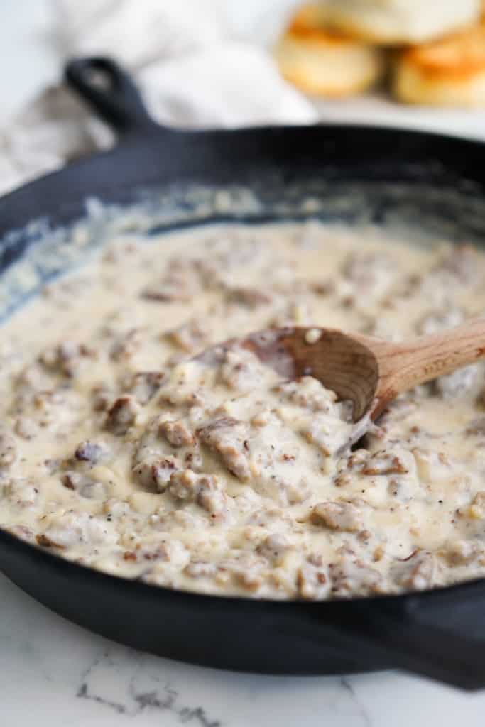 Southern sausage gravy in a cast iron skillet