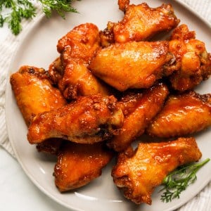 A plate loaded with Hot Honey Chicken Wings