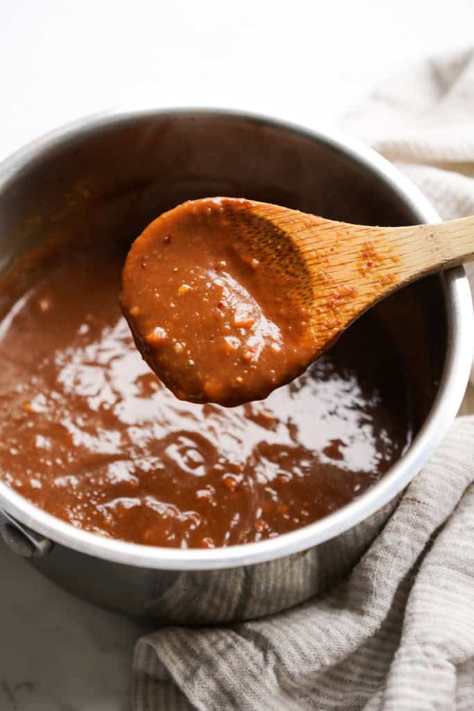 thick peanut sauce in a saucepan