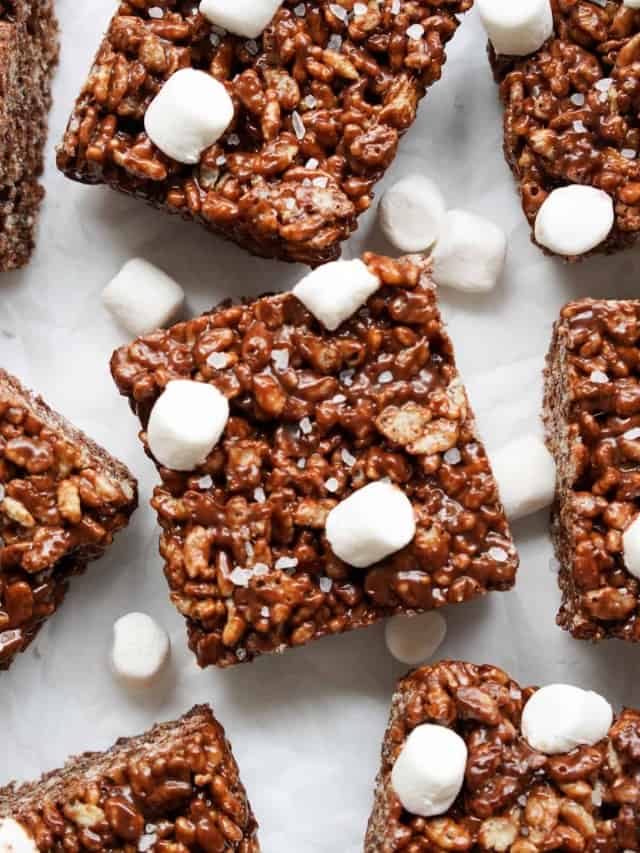 Top down view of square pieces of chocolate flavored rice krispie treats