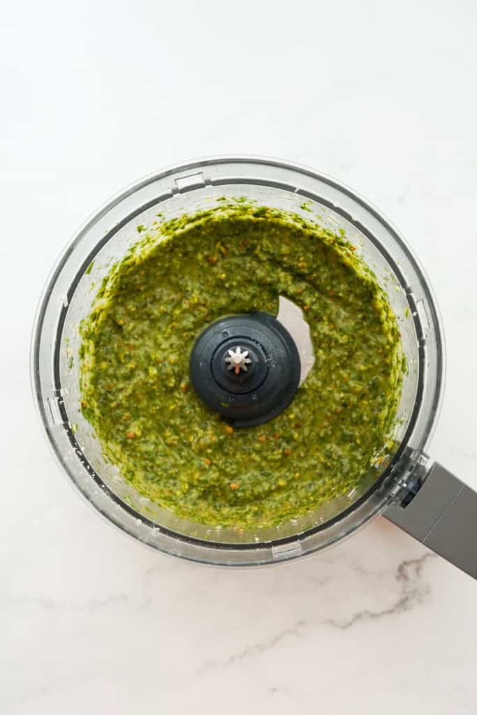 Blended pesto in a blender