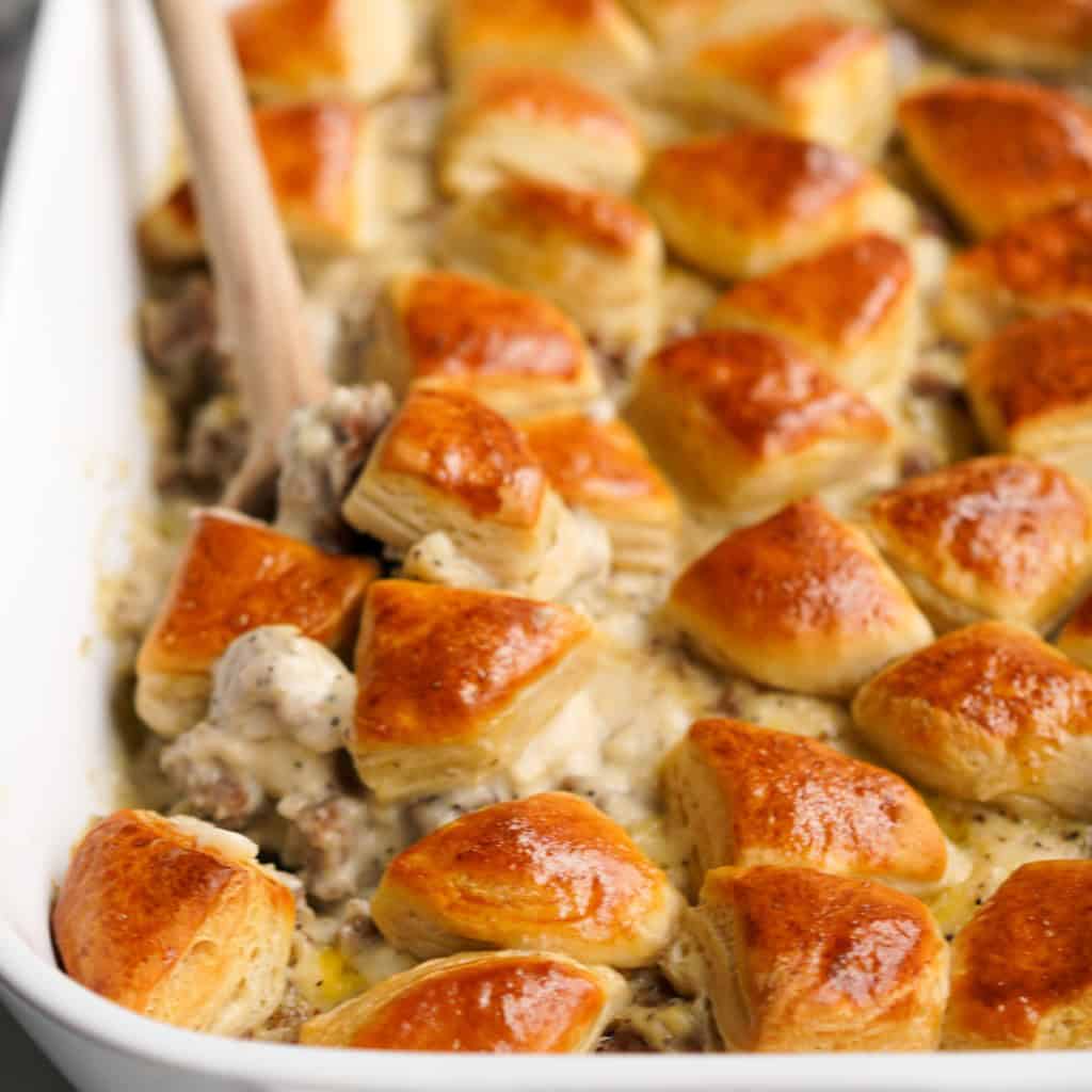 Thick sausage gravy topped with biscuit pieces