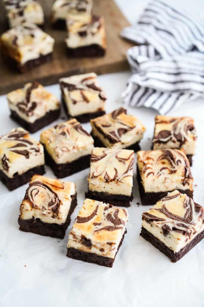 Bite size square brownie cheesecake scattered