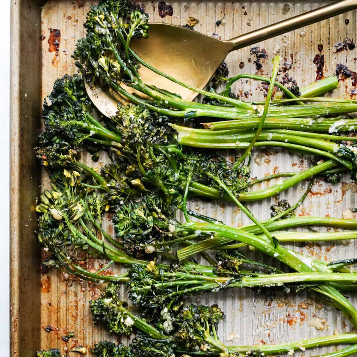 Roasted broccolini on a baking sheet