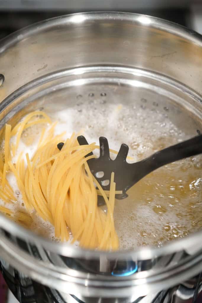 Boiling spaghetti in water in a pot