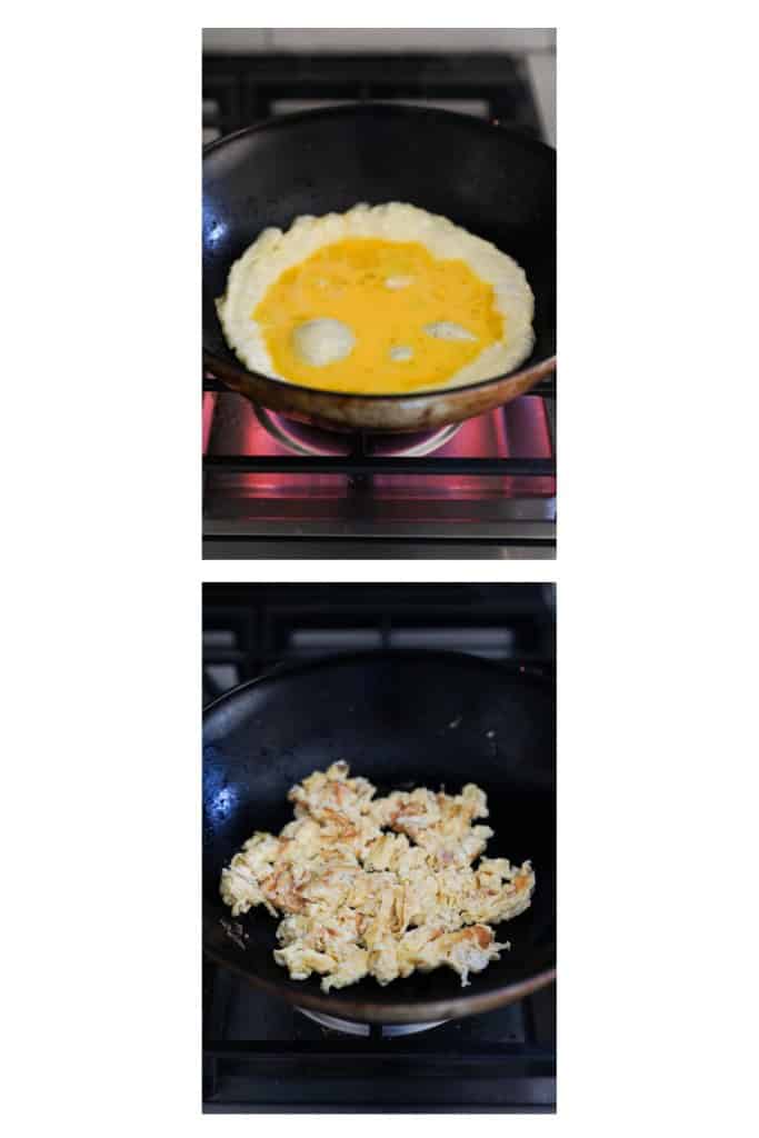Looking eggs and then breaking it into smaller pieces in the wok