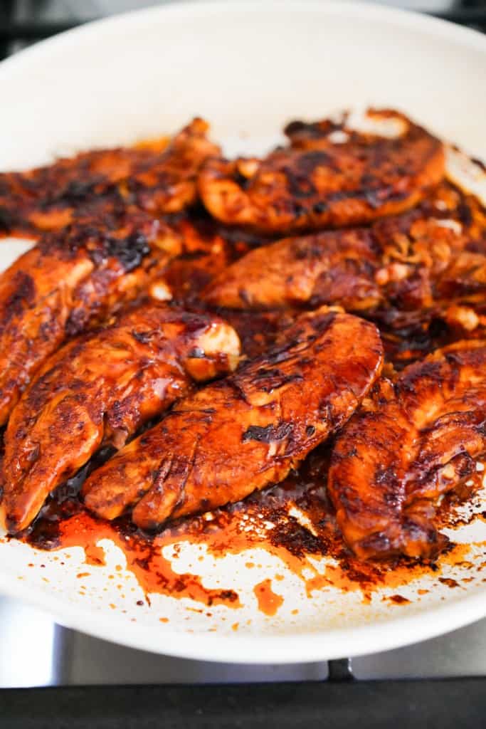 Barbecue chicken seared on a skillet