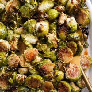 Charred brussels sprouts topped with balsamic glaze