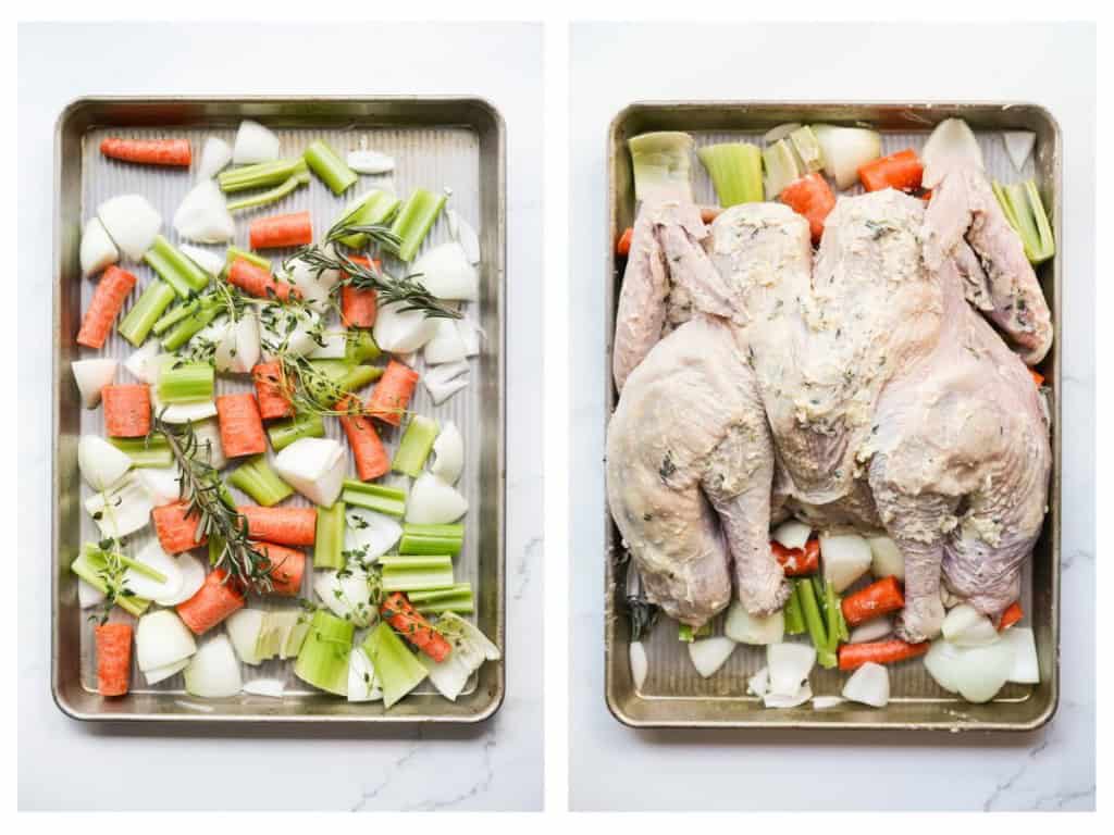 Raw spatchcock turkey on baking sheet with carrots, celery and onions