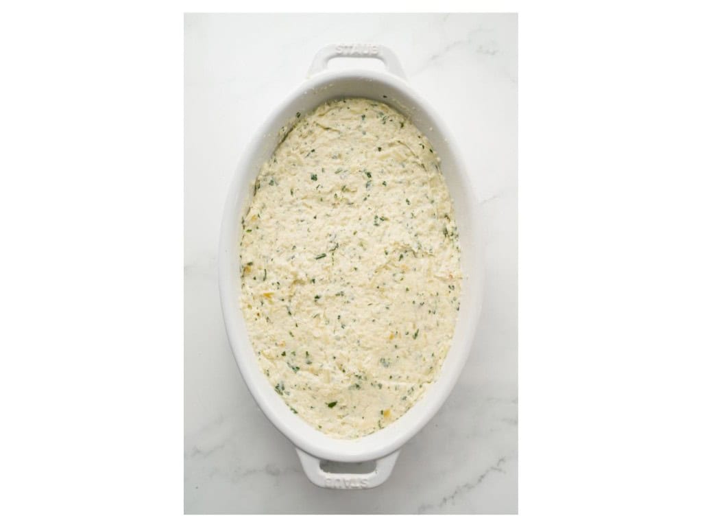 Garlic cream cheese mixture in an oval dish
