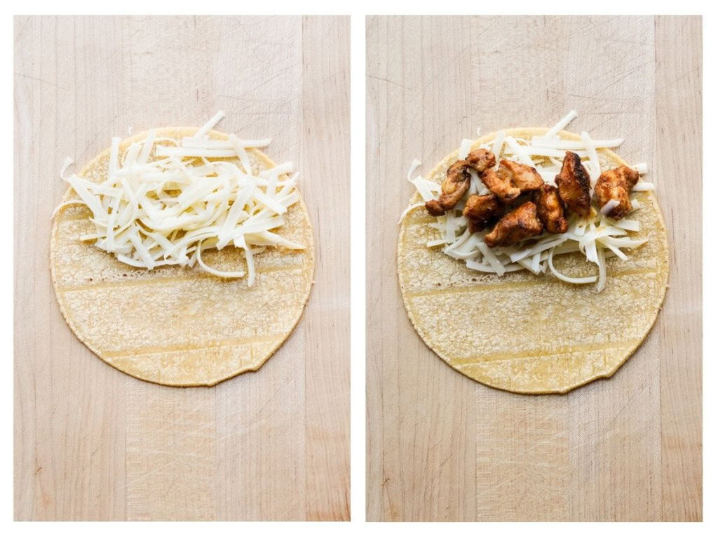 Filing corn tortillas with shredded cheese, followed by chicken pieces