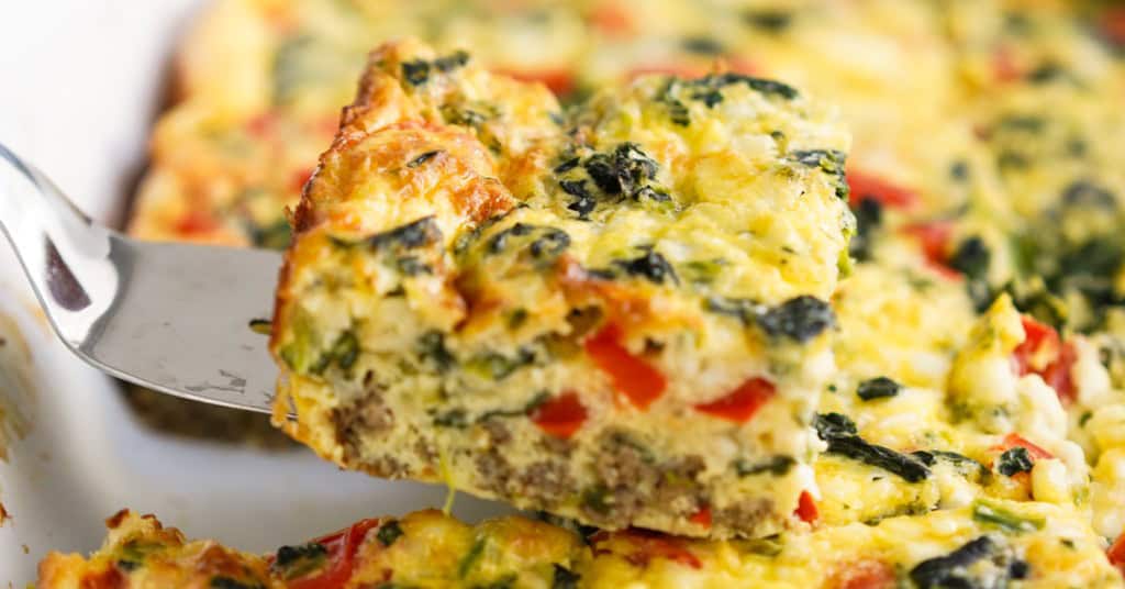 Lifting up a piece of cottage cheese egg bake