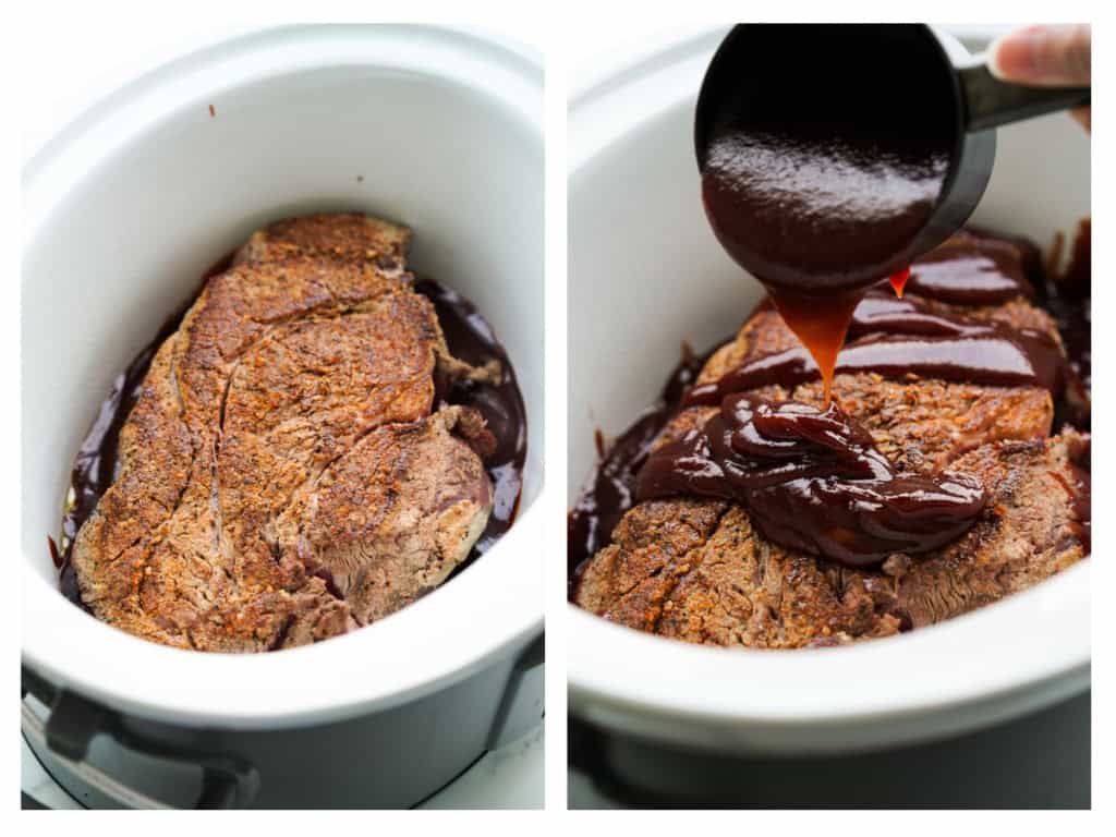 After seasoning and searing the chuck roast, it is added to the slow cooker and topped with BBQ sauce.