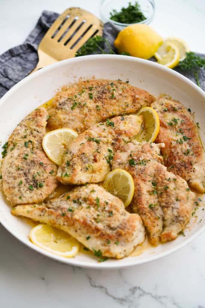 Chicken with Lemon Garlic Sauce is in a skillet.