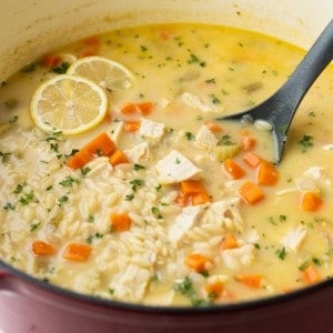 Orzo, carrots, chicken, and a lemon chicken broth are highlights of this Greek Lemon Chicken soup.