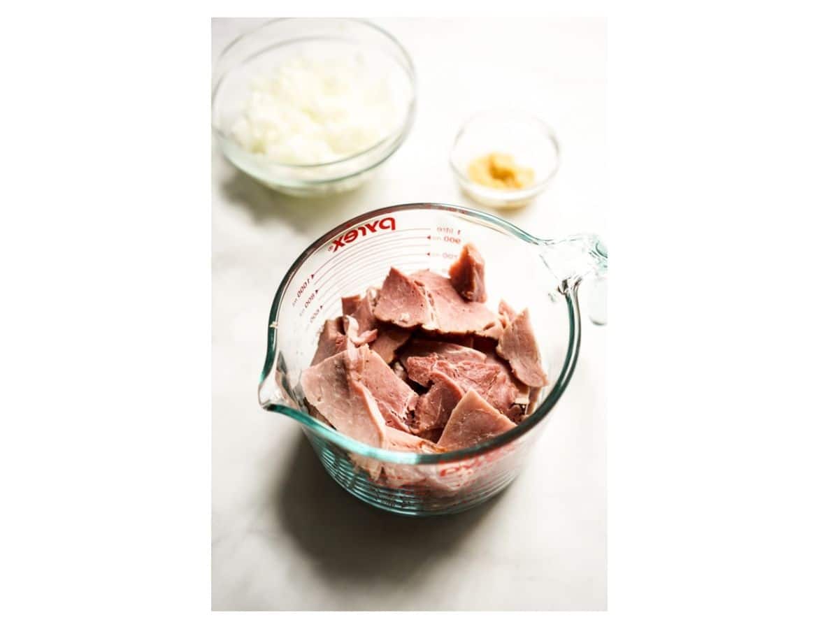 A cup of ham, onions and garlic