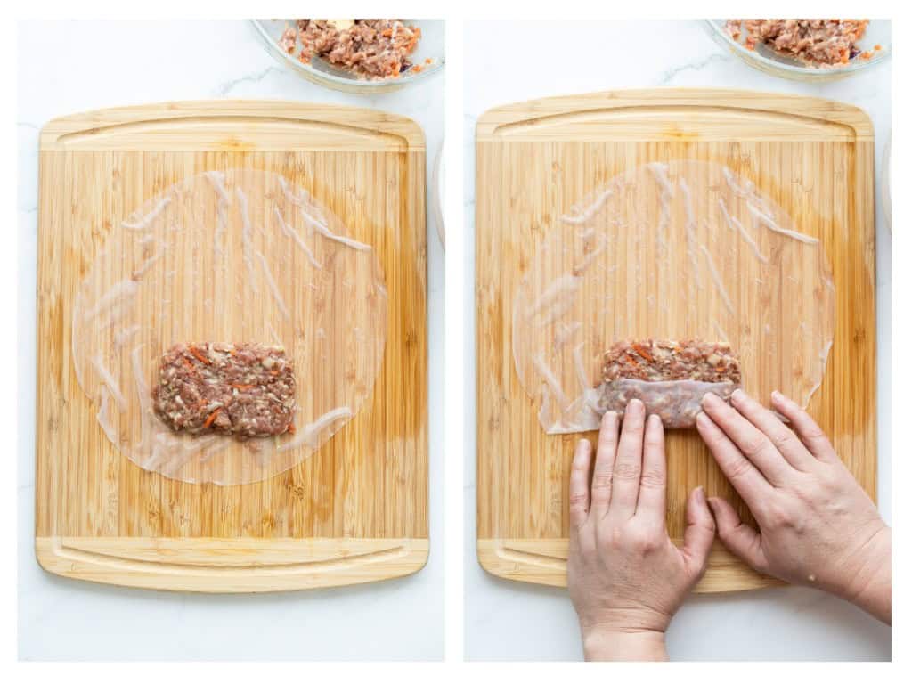 A little less than 1/4 a cup of the filling is added to the lower center of the rice paper wrapper. The filling is flattened into a rectangular shape. The lower portion of the the rice paper wrapper is folded over the filling.