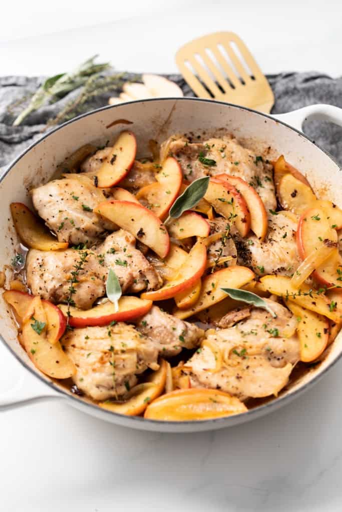 Skillet apple chicken with chicken thighs, onions, garlic, and fresh apples is cooked and ready to eat!