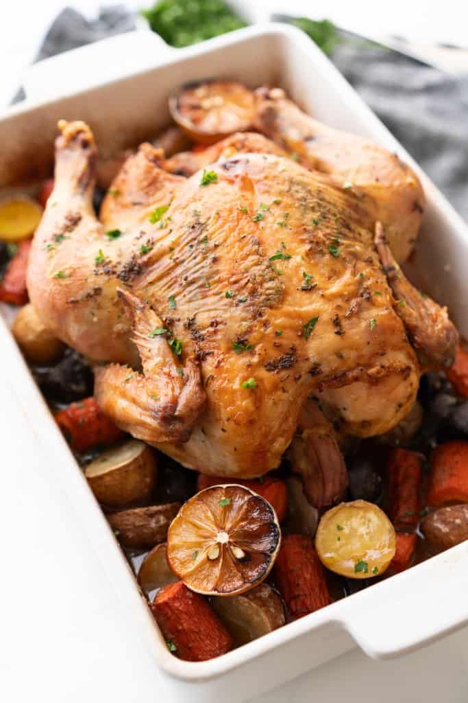 Whole roasted chicken is baked and ready to eat.